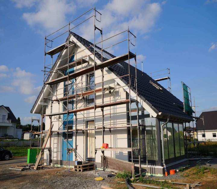 Rénovation, nettoyage de façade et pose de revêtement de mur